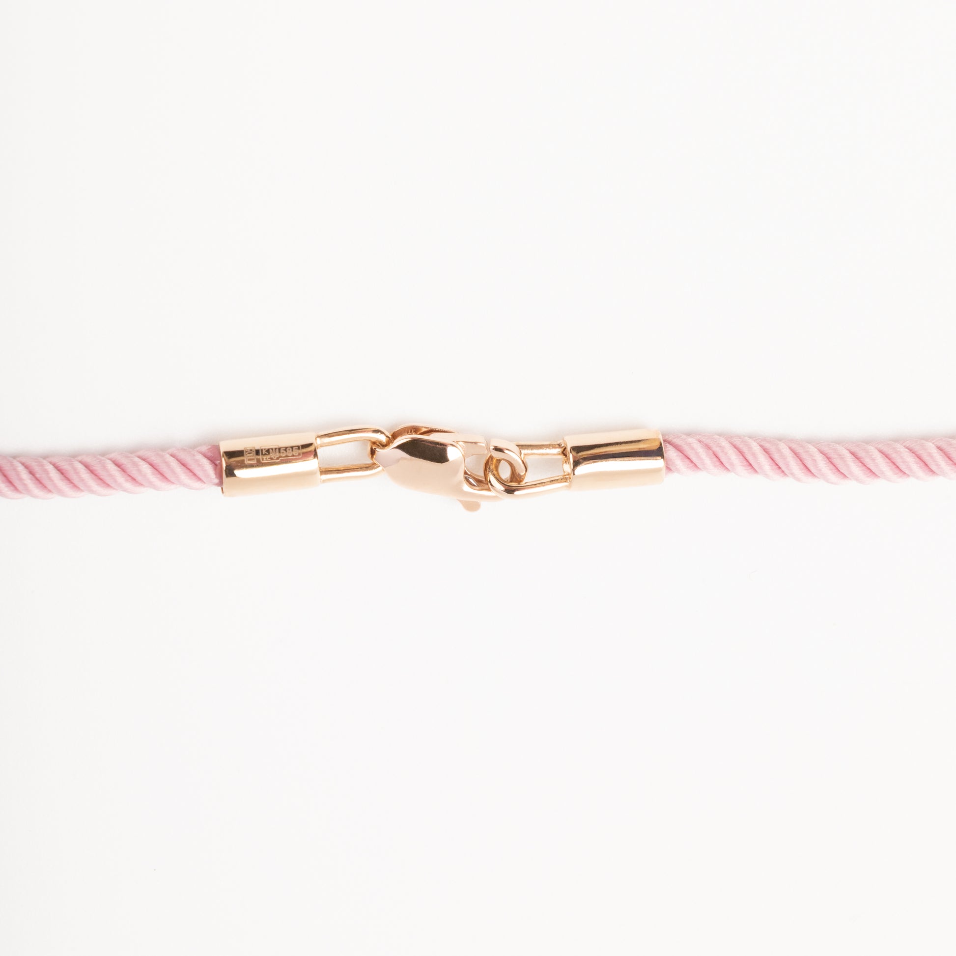 Sophisticated product - a pastel pink twisted silk cord necklace displayed on a white bust, featuring a detailed macro shot of the 14K (585) Rose Gold lobster clasp and 585 hallmark.