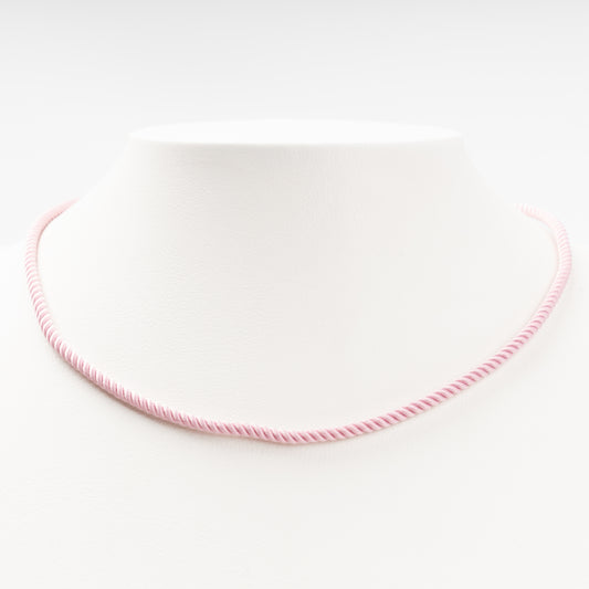 Sophisticated product - a pastel pink twisted silk cord necklace displayed on a white bust, 14K (585) Rose Gold lobster clasp and 585 hallmark.