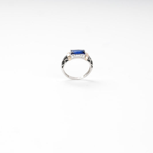 Silver and Gold 375 blue alpinite ring, angled view