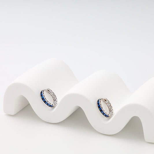 White gold blue CZ huggie hoops front view - Kabluchka