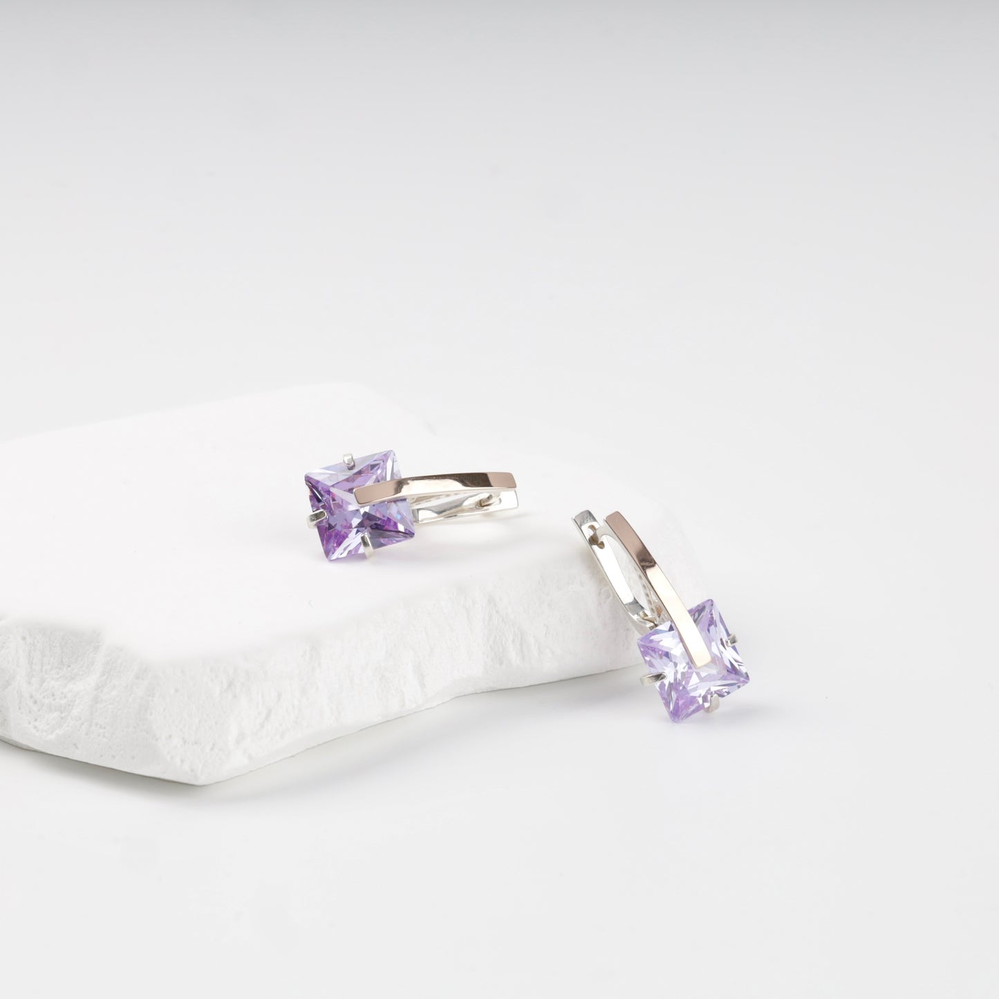 Purple cubic zirconia drop earrings — angled display — Kabluchka