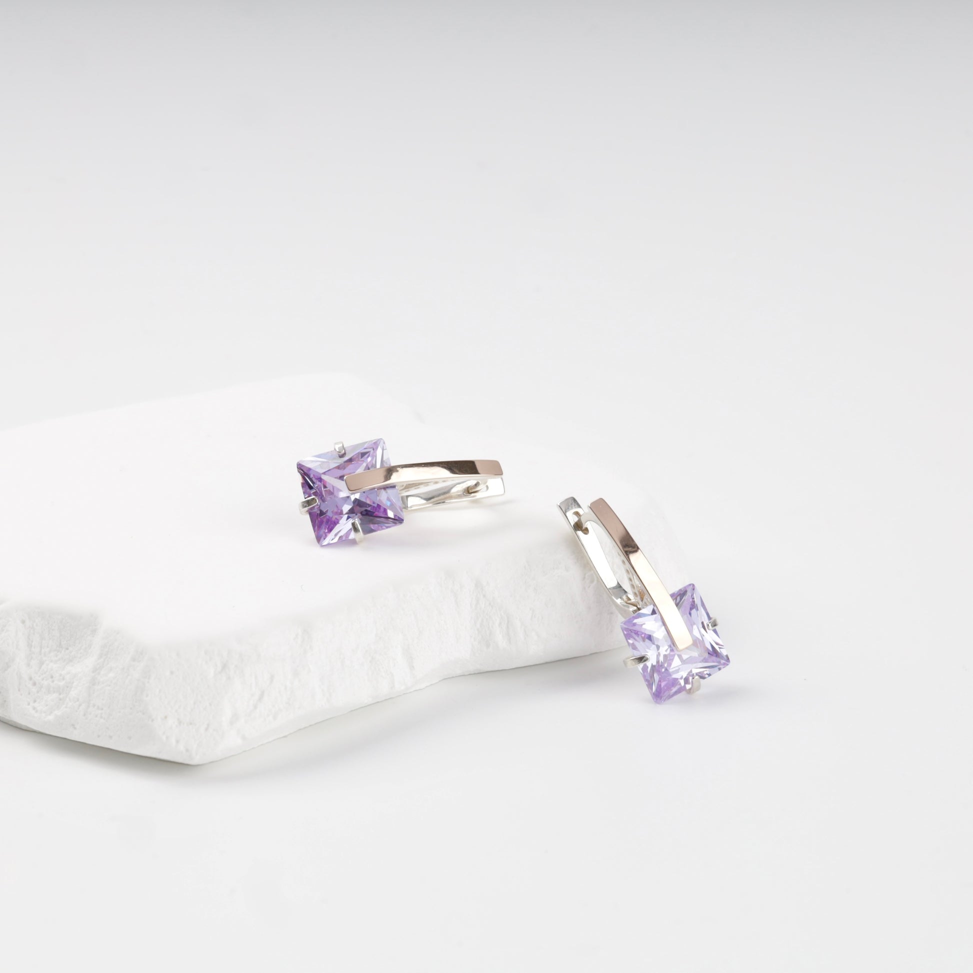 Purple cubic zirconia drop earrings — angled display — Kabluchka