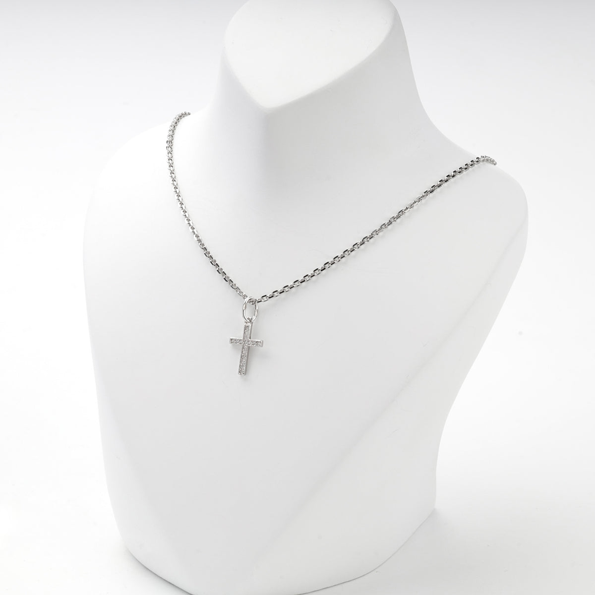 Silver 925 cross pendant with clear cubic zirconia, display view
