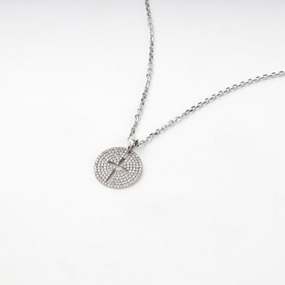 Rhodium-plated silver 925 round cross pendant with clear cubic zirconia, back view