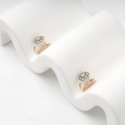 Rose Gold 14K (585) Blue and Clear Cubic Zirconia Flower Halo Earrings — side view — Kabluchka