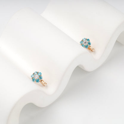 Rose Gold 14K (585) Blue and Clear Cubic Zirconia Flower Halo Earrings — angled view — Kabluchka