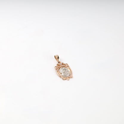Two-tone gold cubic zirconia religious pendant, front view