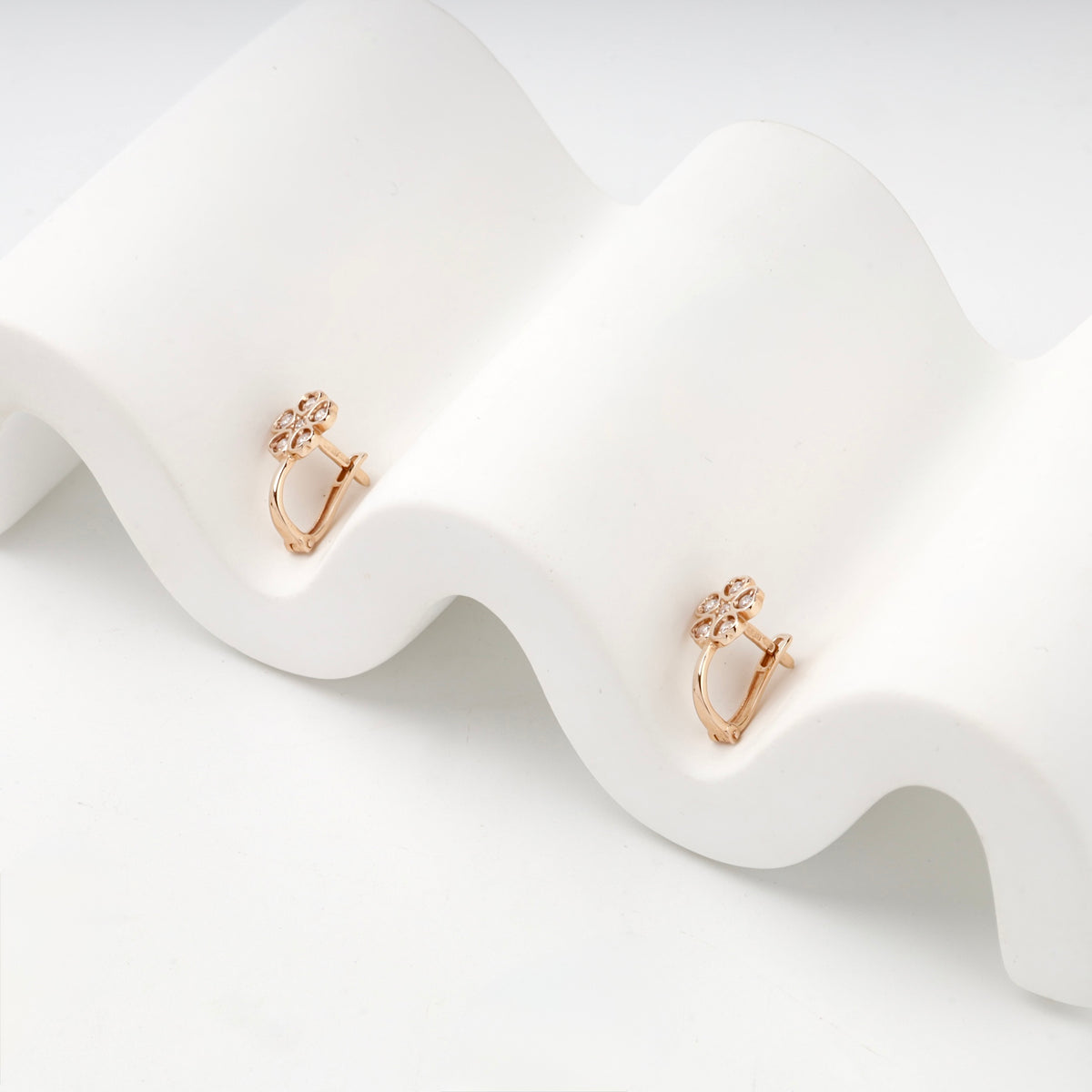 Children's rose gold flower earrings — side view — Kabluchka