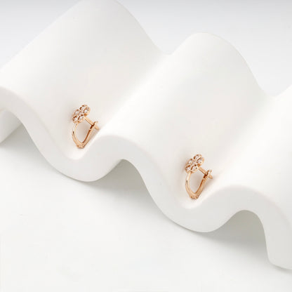 Children's rose gold flower earrings — side view — Kabluchka