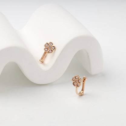 Children's rose gold flower earrings — angled view — Kabluchka