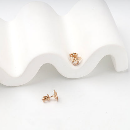 Rose Gold 14K (585) Cubic Zirconia Bow Stud Earrings — angled view — Kabluchka