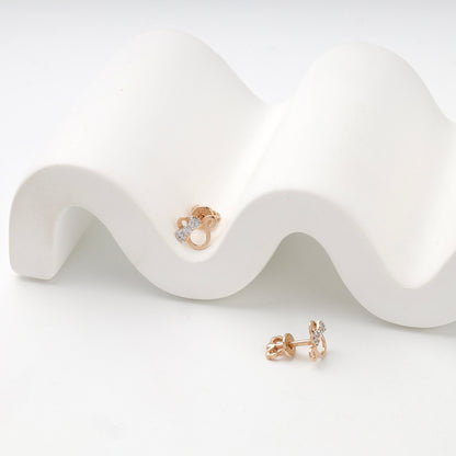 Rose Gold 14K (585) Cubic Zirconia Circular Stud Earrings — angled view — Kabluchka
