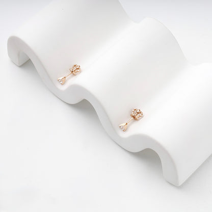 Rose Gold 14K (585) Cubic Zirconia Solitaire Stud Earrings — side view — Kabluchka