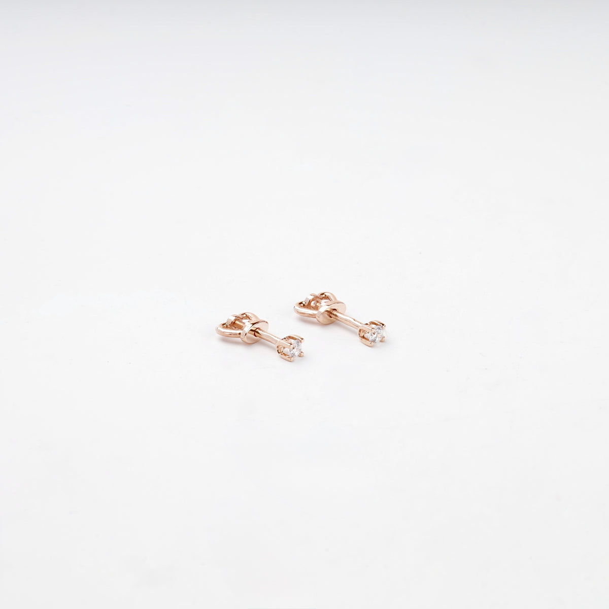 Rose Gold 14K (585) Petite Cubic Zirconia Stud Earrings — angled view — Kabluchka