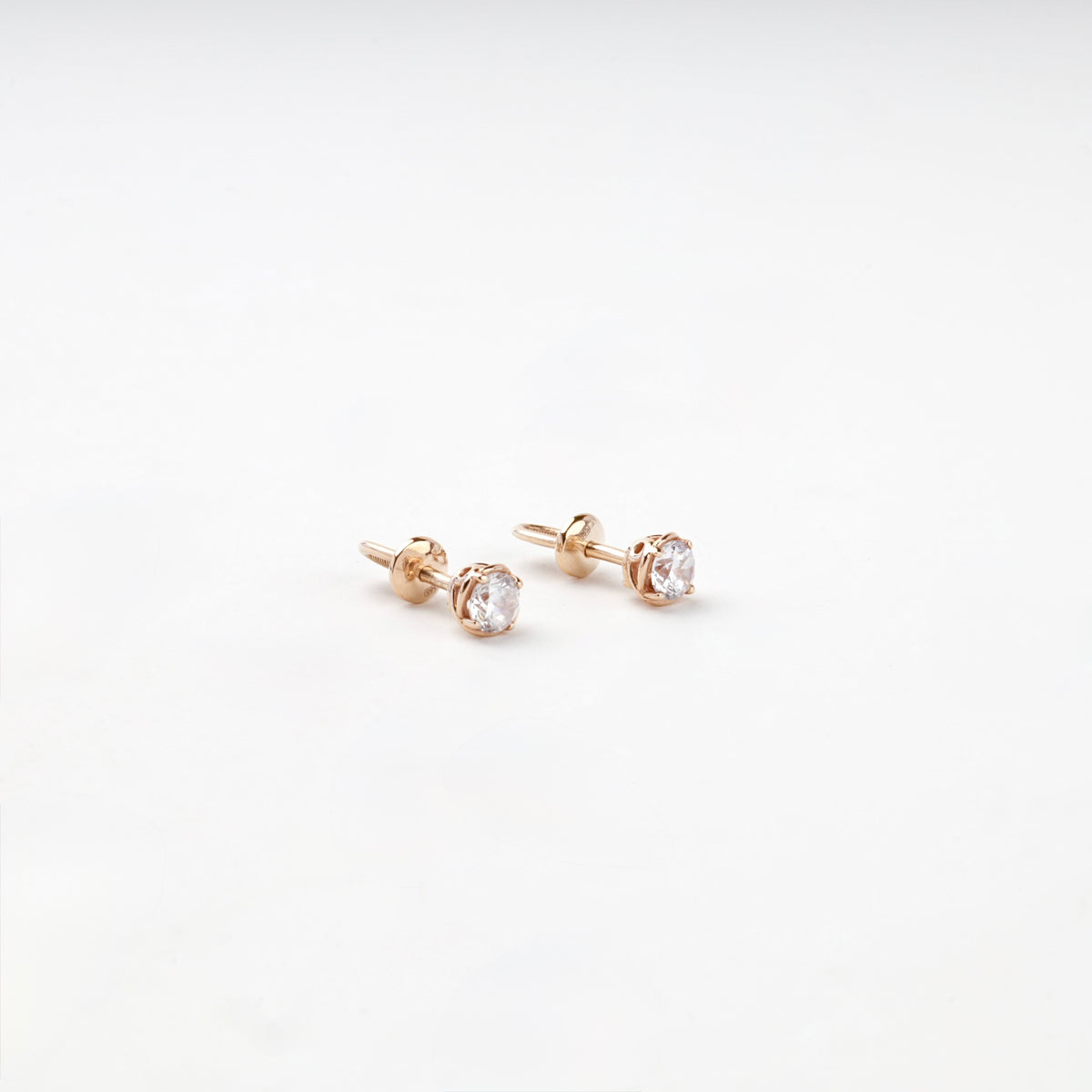 Rose Gold 14K (585) Basket-Set Cubic Zirconia Stud Earrings — angled view — Kabluchka