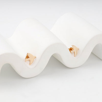 Polished bird stud earrings in rose gold — pair view — Kabluchka