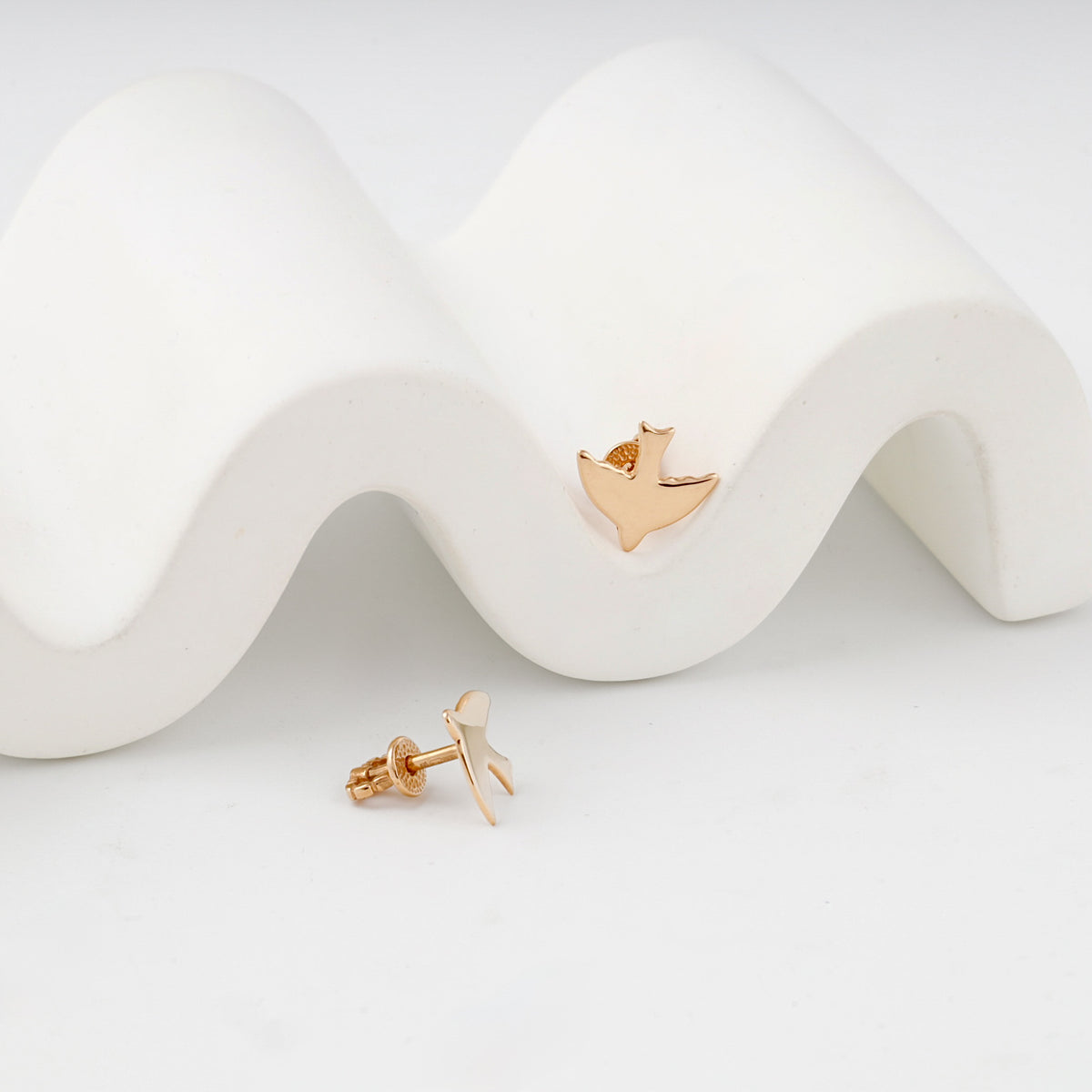 Rose gold bird stud earrings — front and screw-back view — Kabluchka