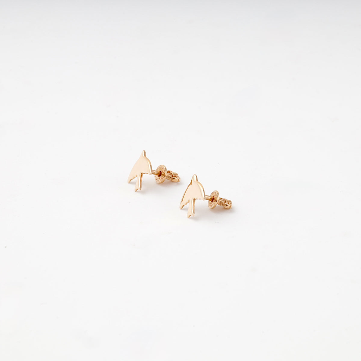 Rose gold bird stud earrings — screw-back closure detail — Kabluchka