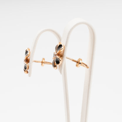 Side profile of 14K (585) Rose Gold floral earrings showing the high-security threaded screw-back fastening and polished gold finish.