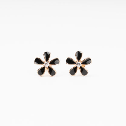 Symmetrical front view of black enamel flower studs in 14K (585) Rose Gold with shimmering crystal centers on a clean white background.