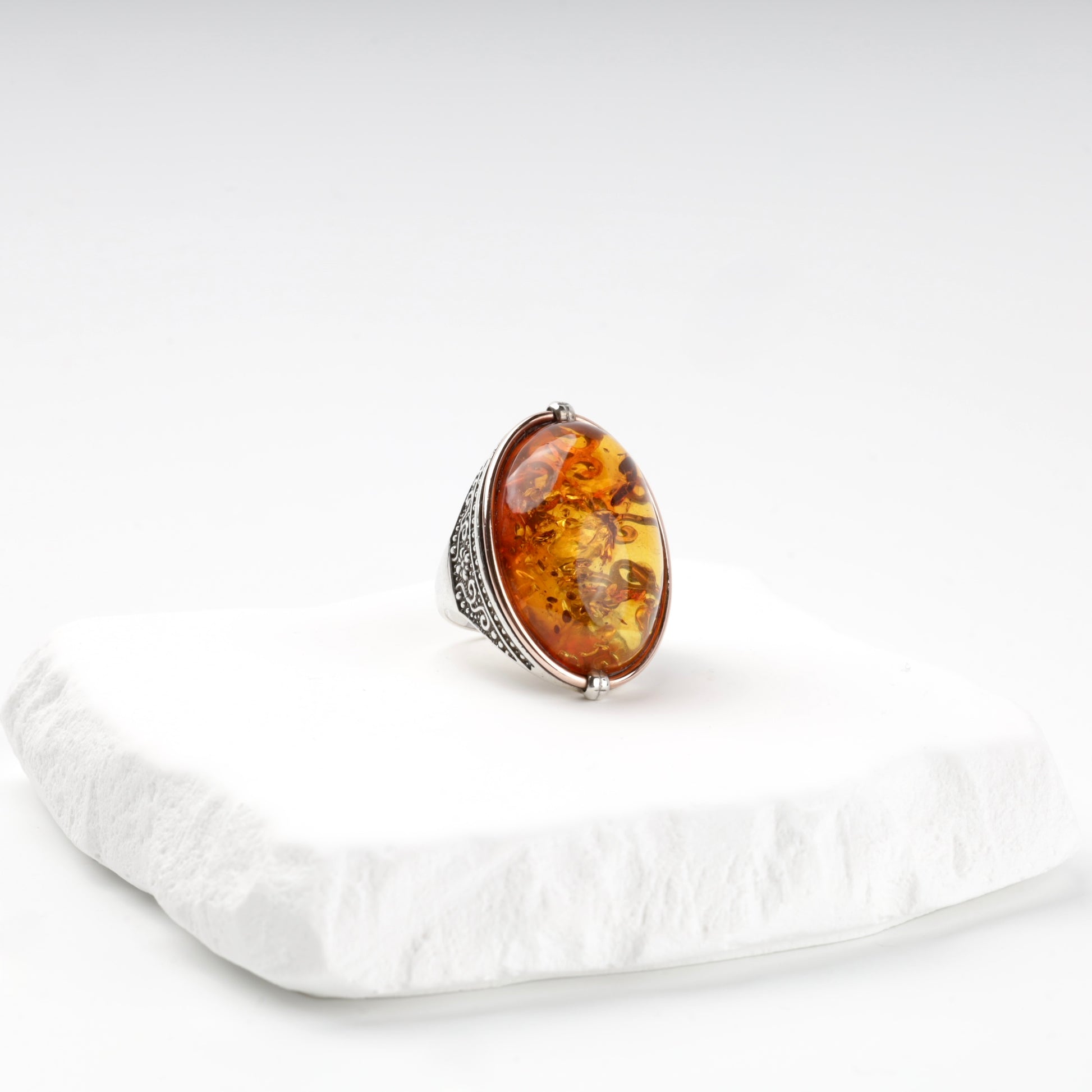 Large oval amber ring close-up — Kabluchka Jewelry Store