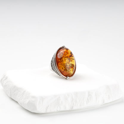 Large oval amber ring close-up — Kabluchka Jewelry Store