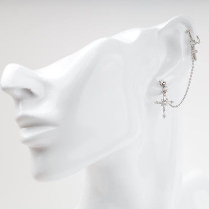 Cross ear cuff chain earring shown worn on the ear — Kabluchka