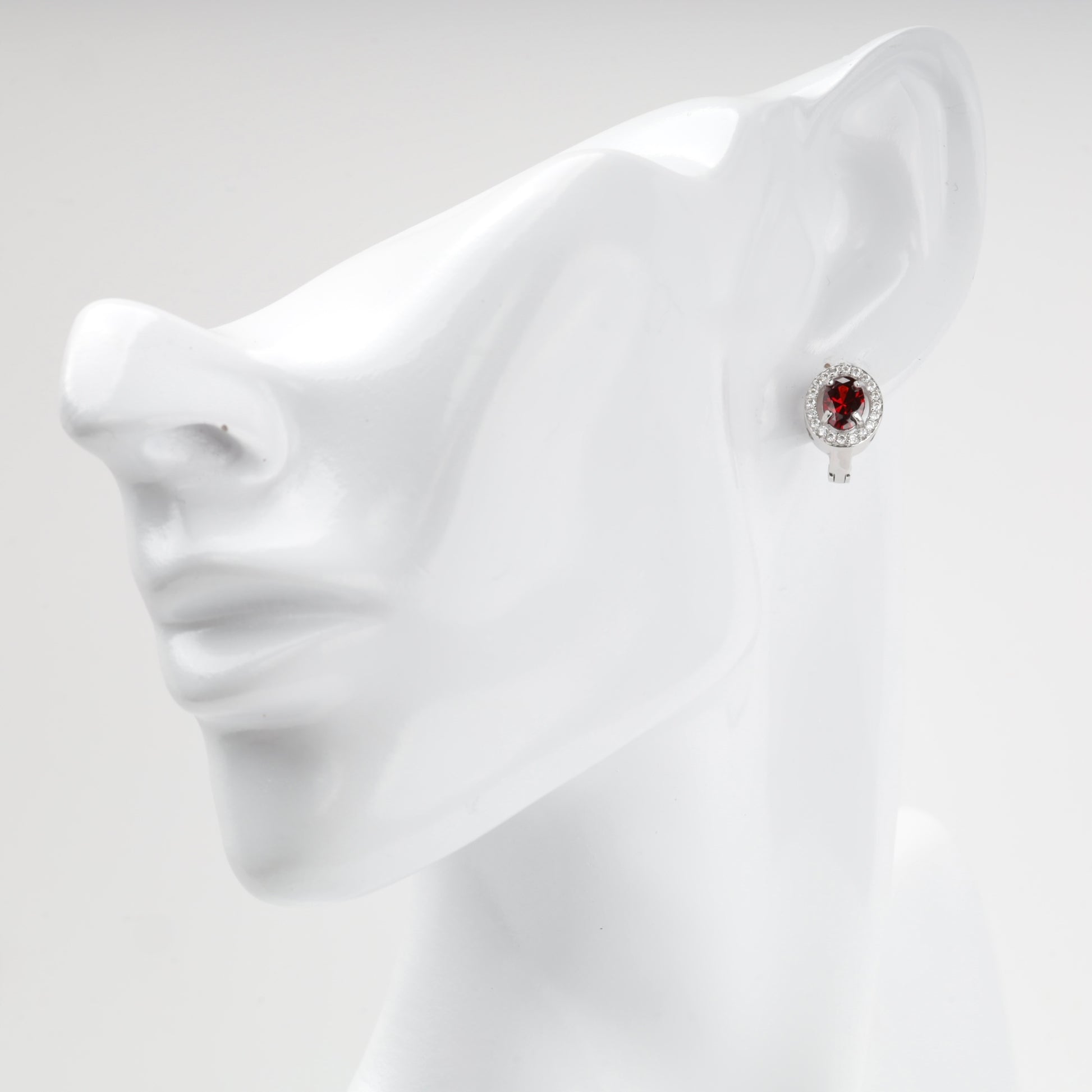 Red cubic zirconia halo earring shown on ear — Kabluchka