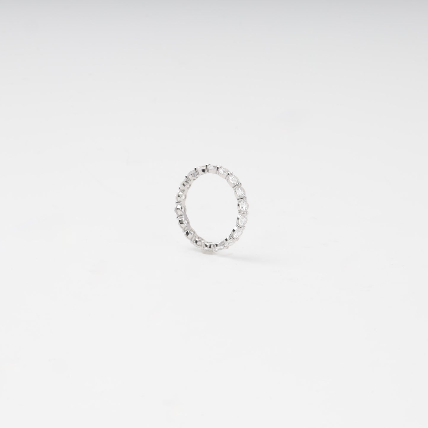 Silver 925 eternity ring with round cubic zirconia — angled view — Kabluchka