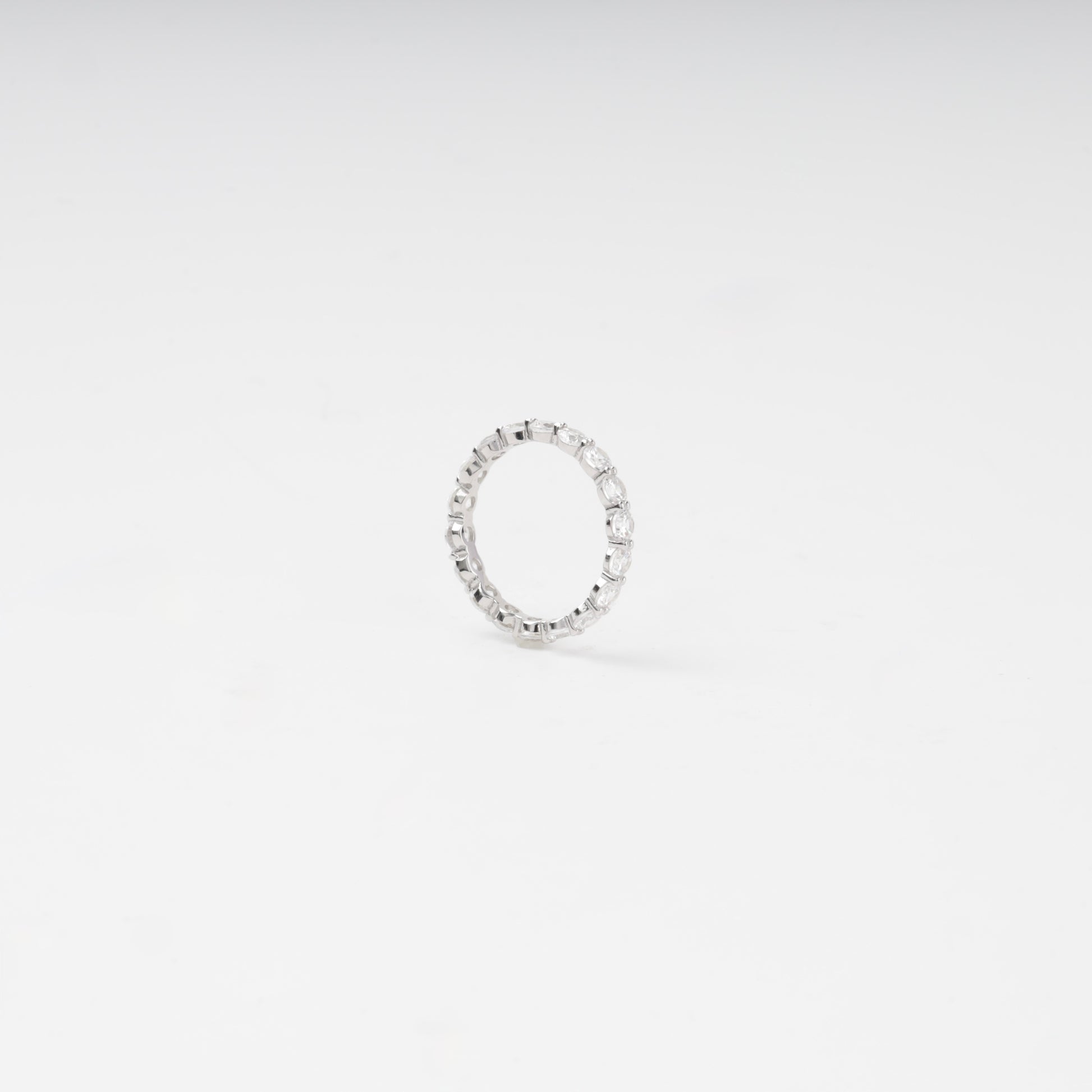 Silver 925 eternity ring with round cubic zirconia — angled view — Kabluchka