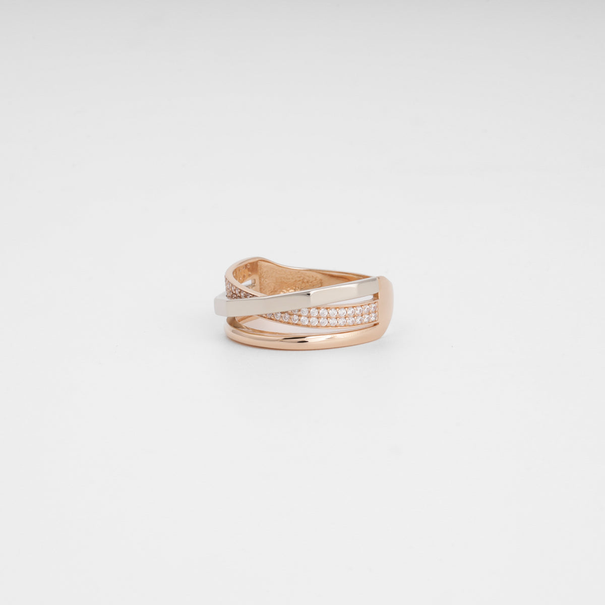 Two-tone gold cubic zirconia crossing ring — angled view — Kabluchka