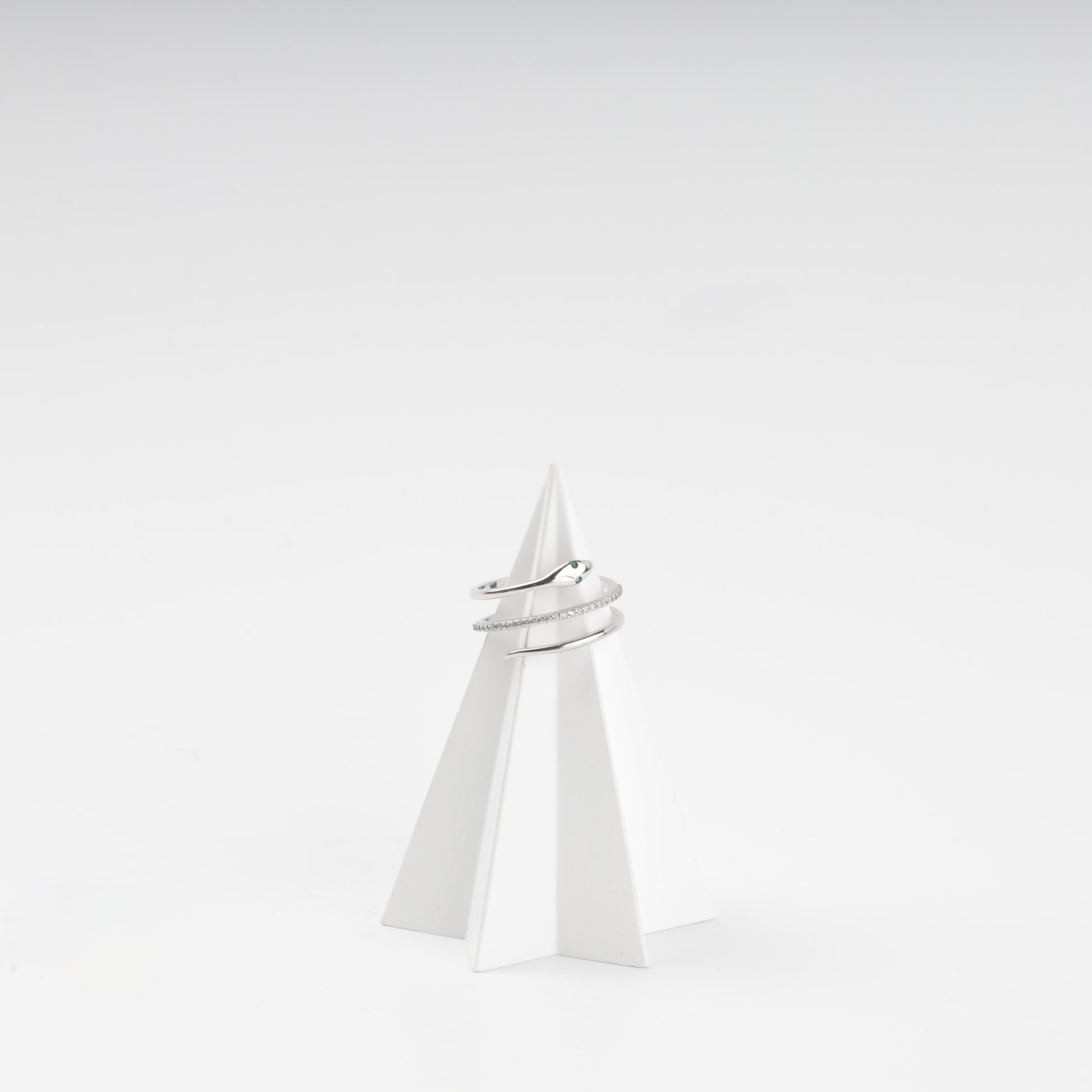 Silver 925 snake wrap ring on a stand, front view — Kabluchka