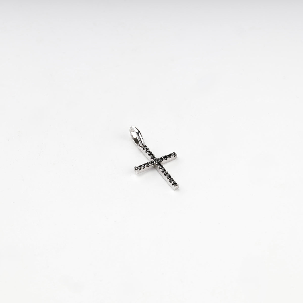 Silver 925 cross pendant with black cubic zirconia, front view