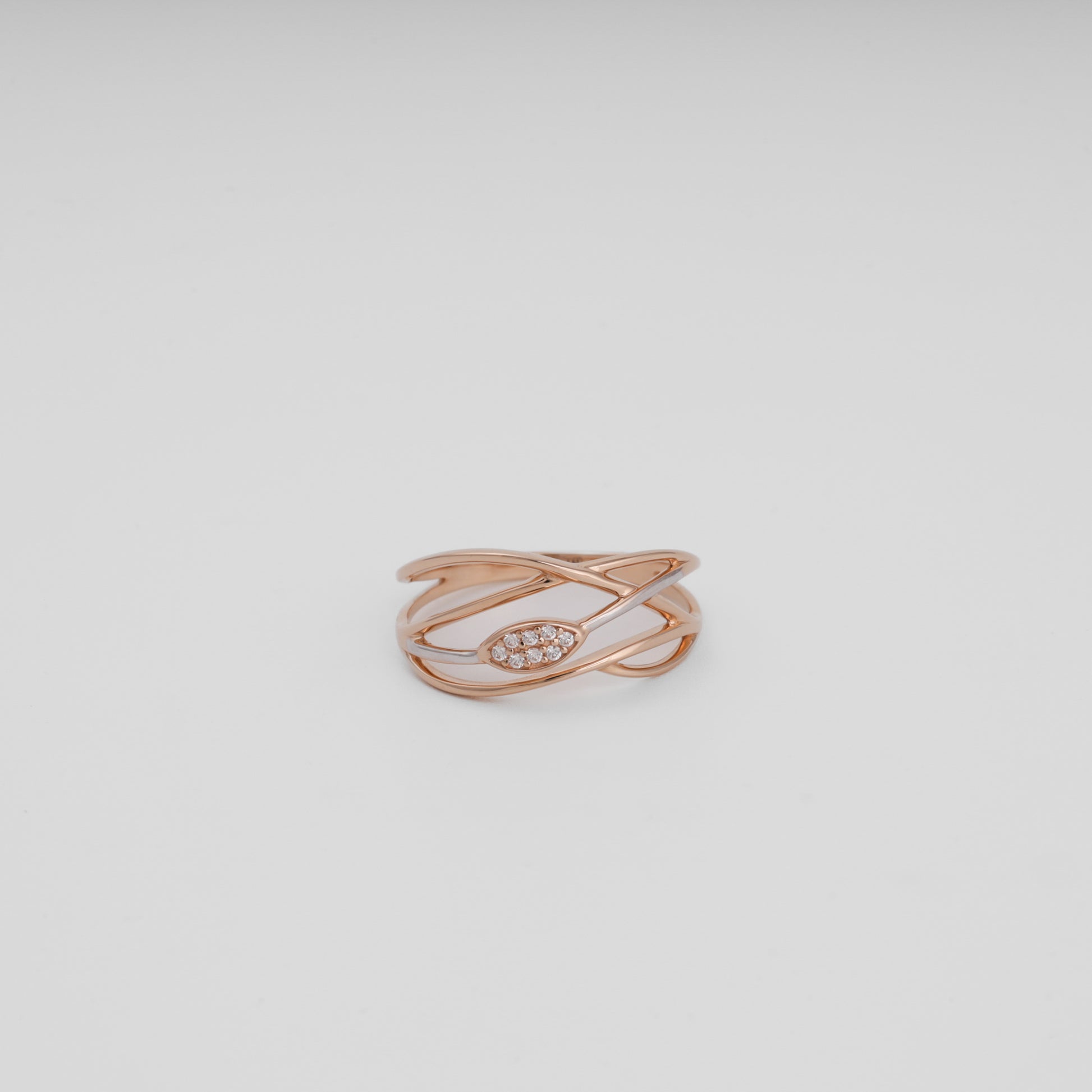 Rose gold intertwining band ring with CZ cluster top view - Kabluchka