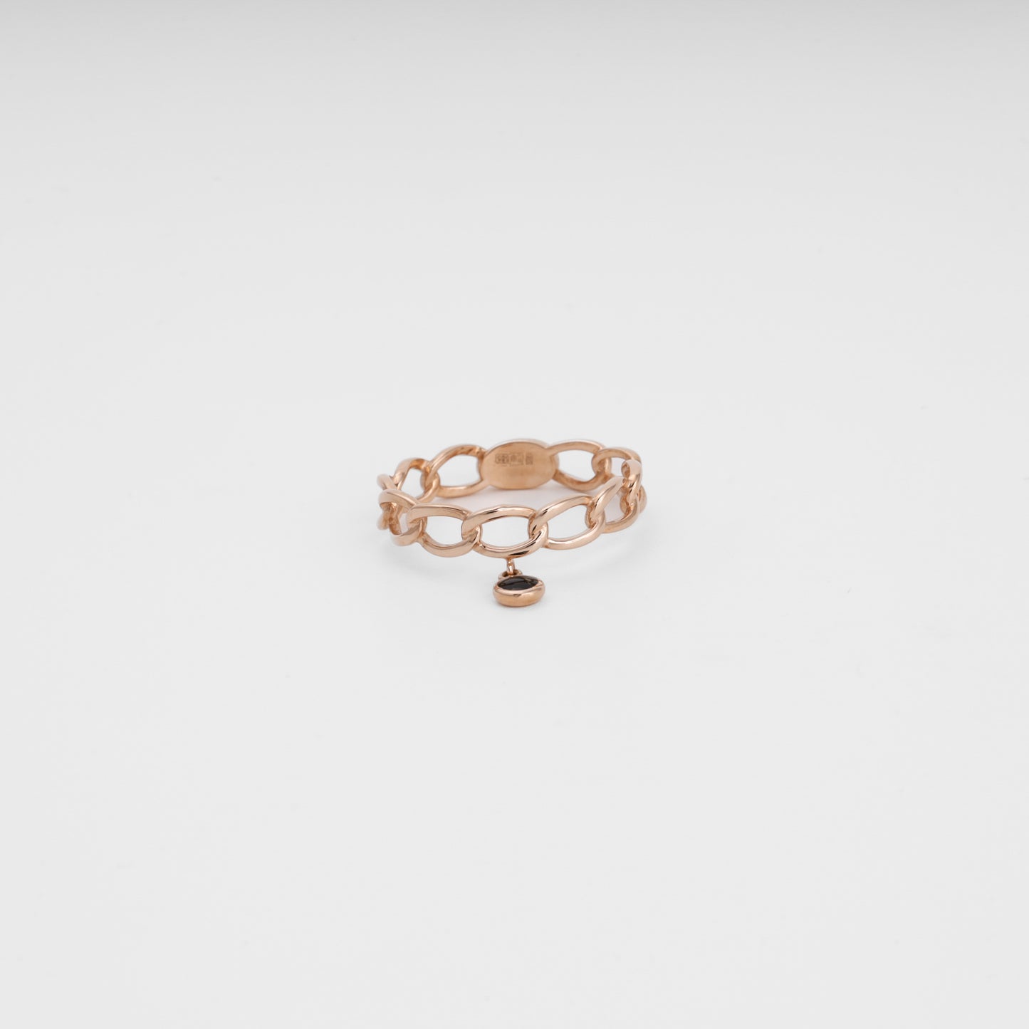 Rose gold chain ring with black charm angled view showing hallmark - Kabluchka