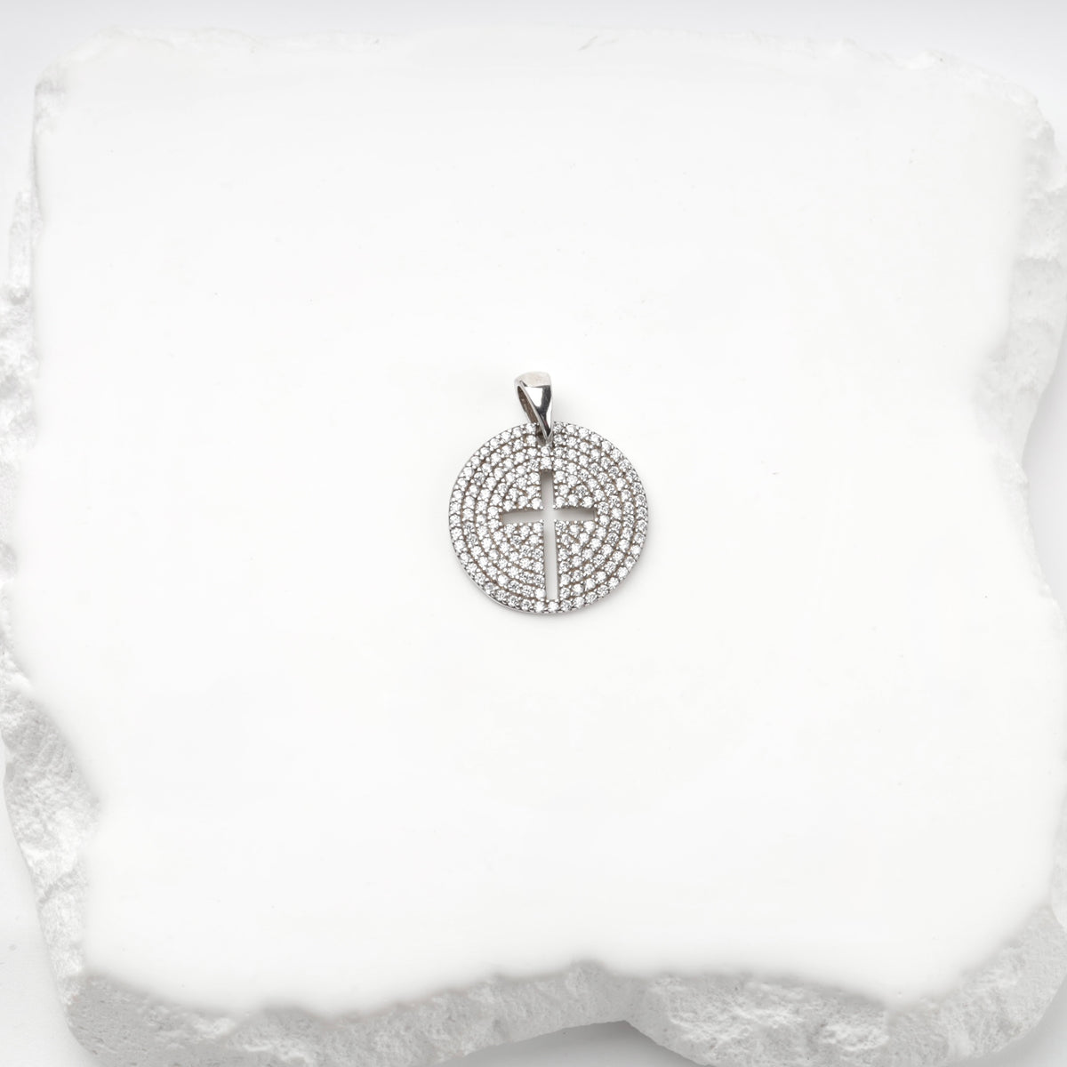 Rhodium-plated silver 925 round cross pendant with clear cubic zirconia, front view