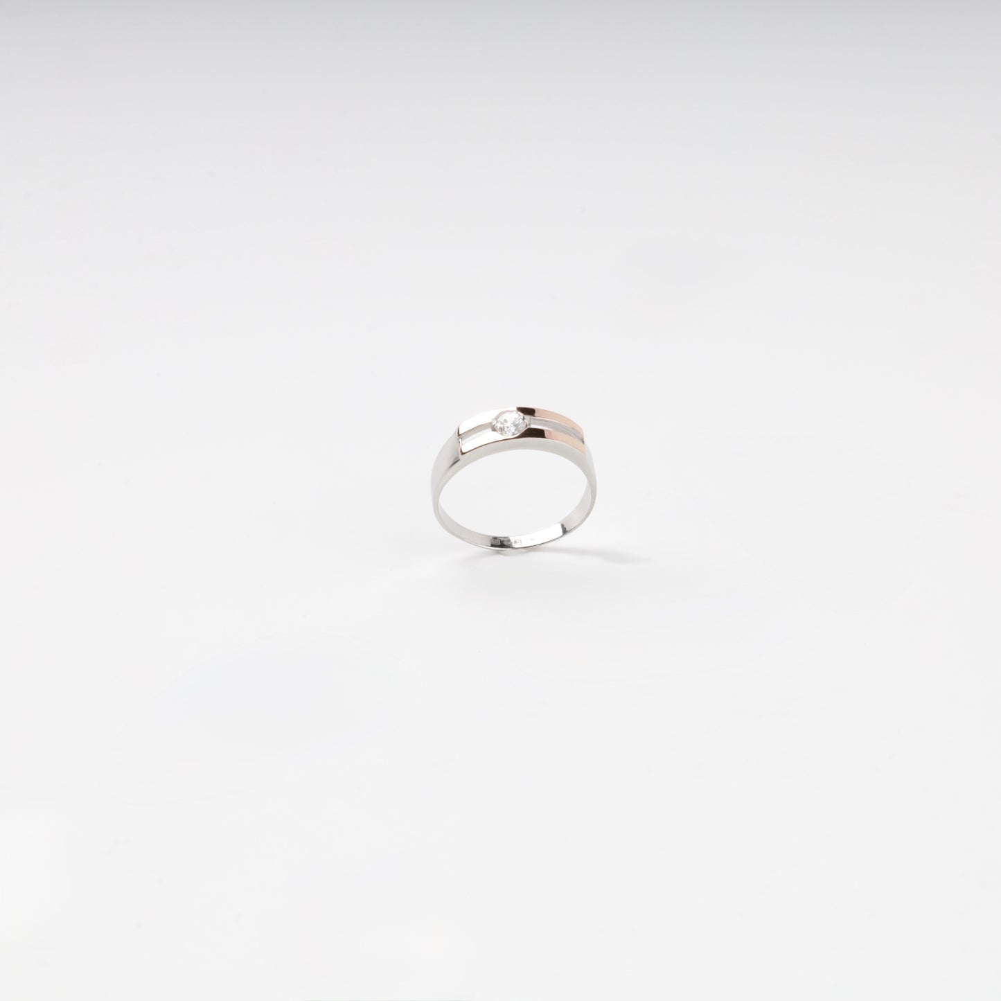 Two-tone cubic zirconia ring — angled view — Kabluchka