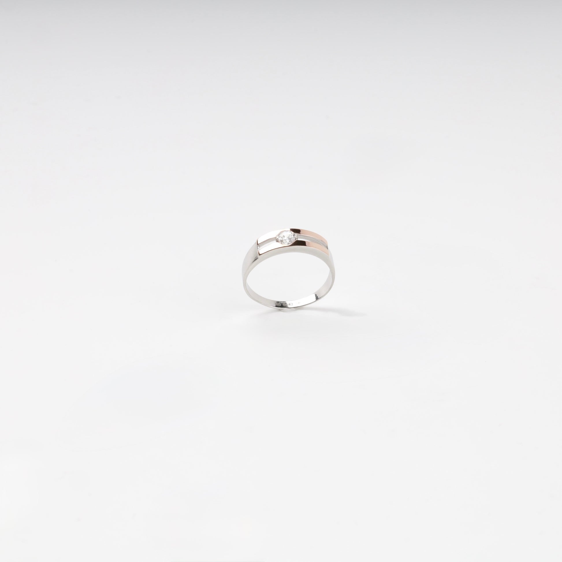 Two-tone cubic zirconia ring — angled view — Kabluchka