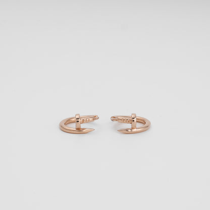 14K rose gold huggie hoop close-up smooth surface — Kabluchka