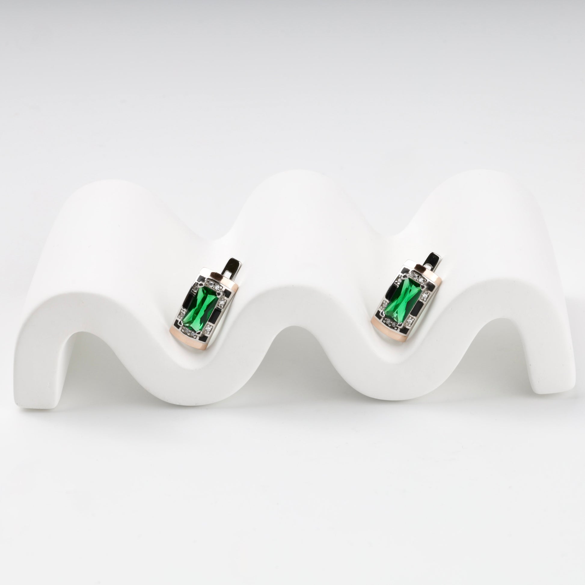 Silver and Gold 375 green alpinite earrings, angled view
