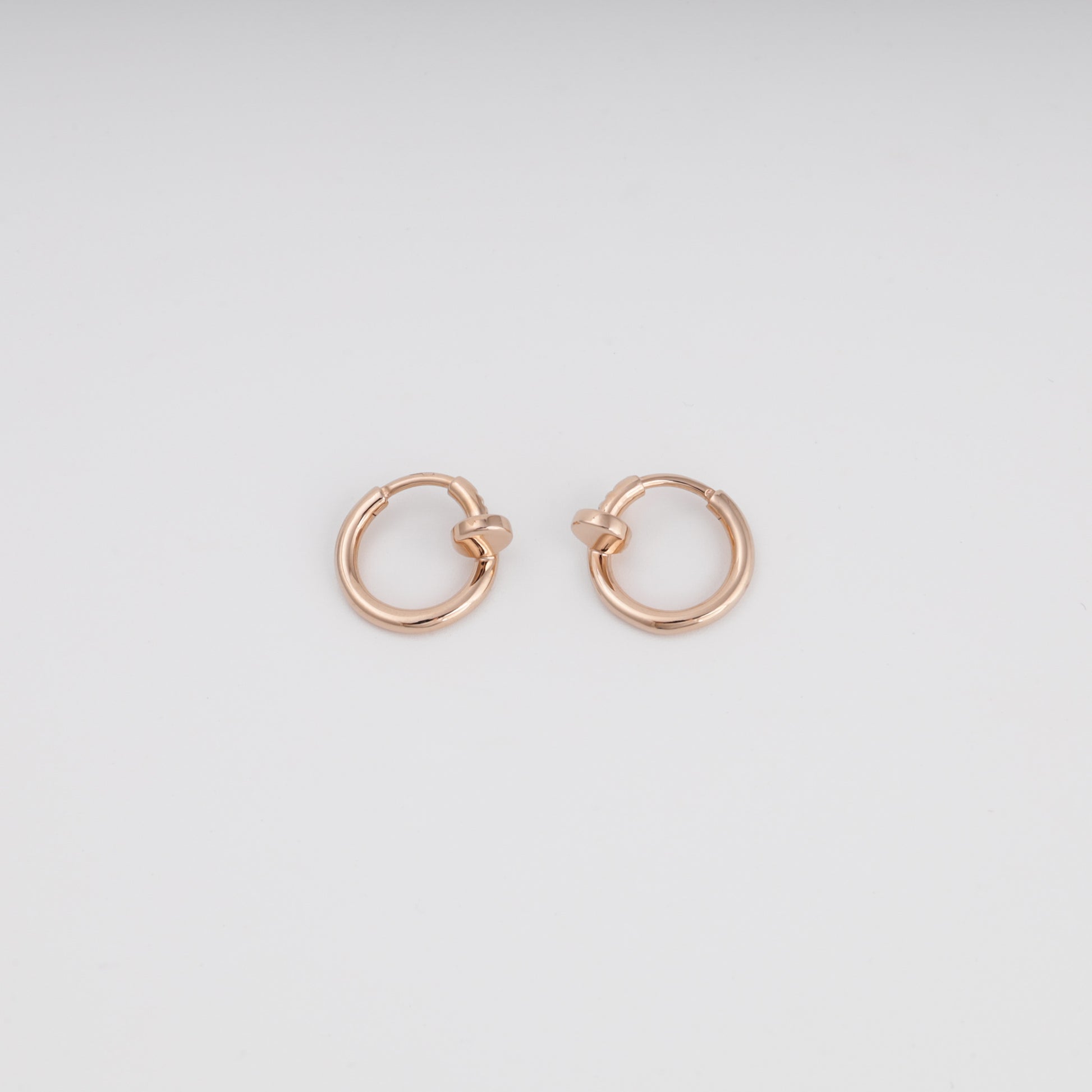 Minimalist rose gold huggie earrings side profile view — Kabluchka