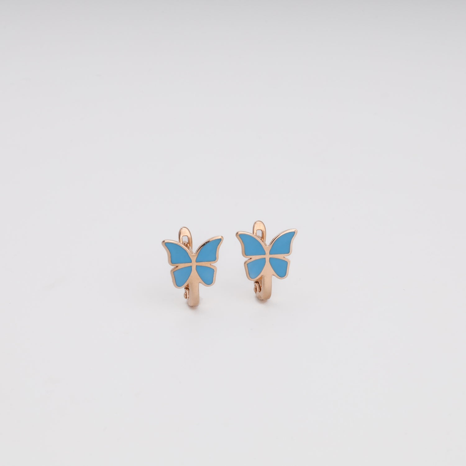 Blue butterfly lever-back earrings in 14K rose gold with enamel wings — Kabluchka Jewelry Store