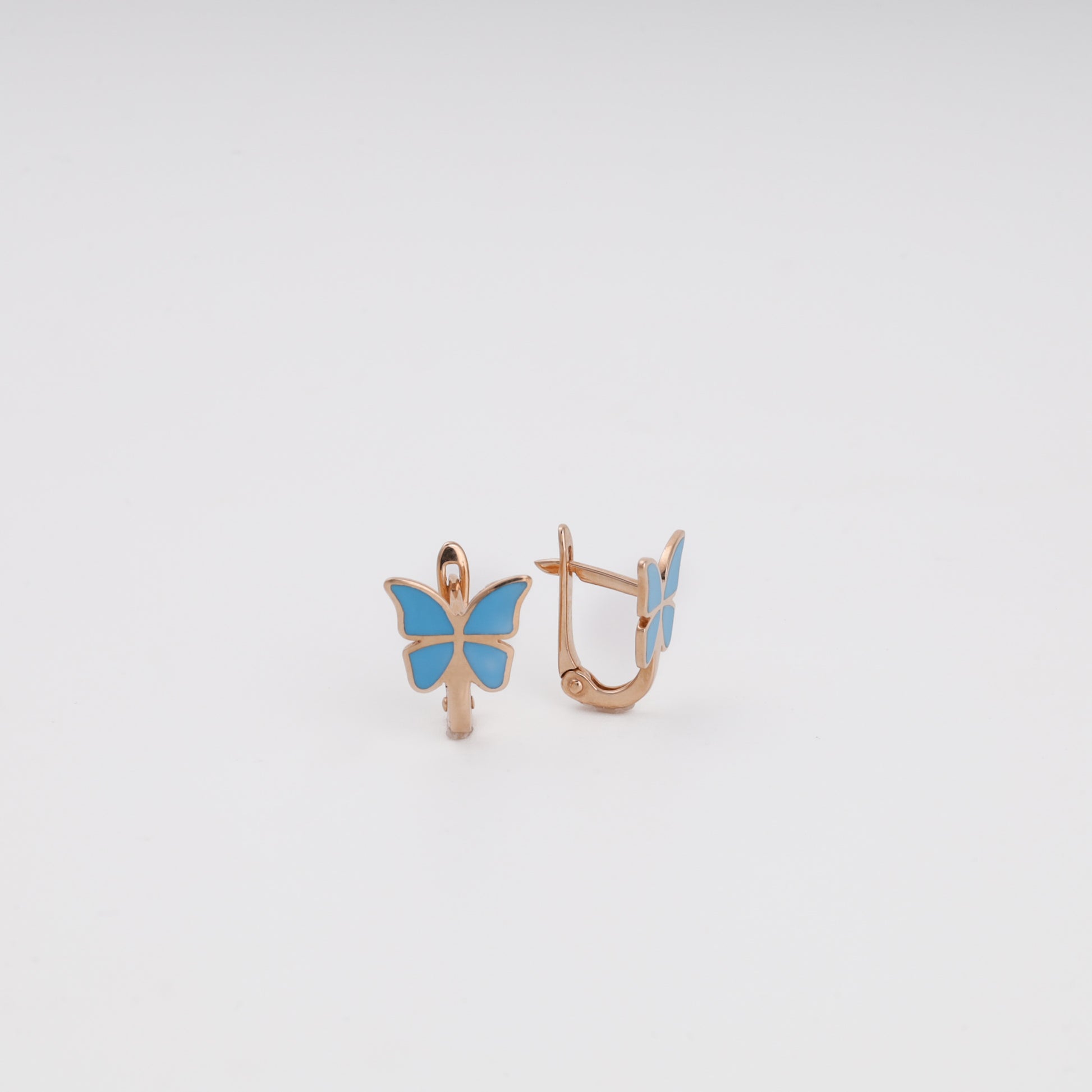 Kids blue butterfly gold earrings showing lever-back English lock closure