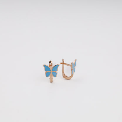 Kids blue butterfly gold earrings showing lever-back English lock closure
