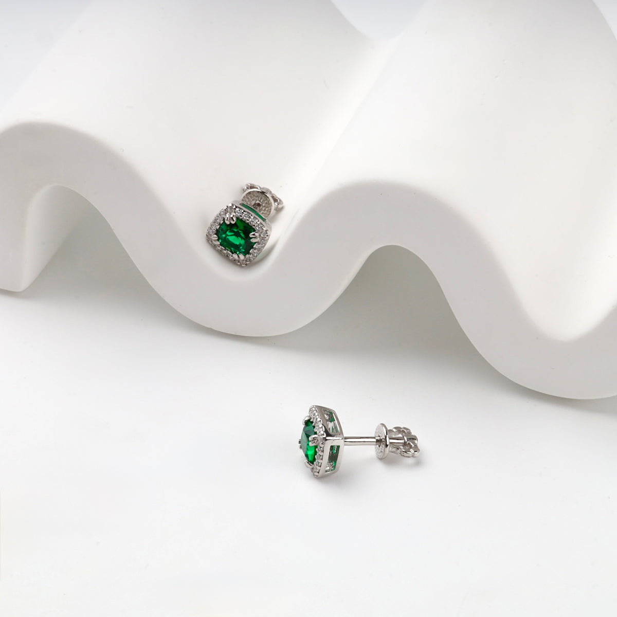Silver 925 green cubic zirconia stud earring, angled front view