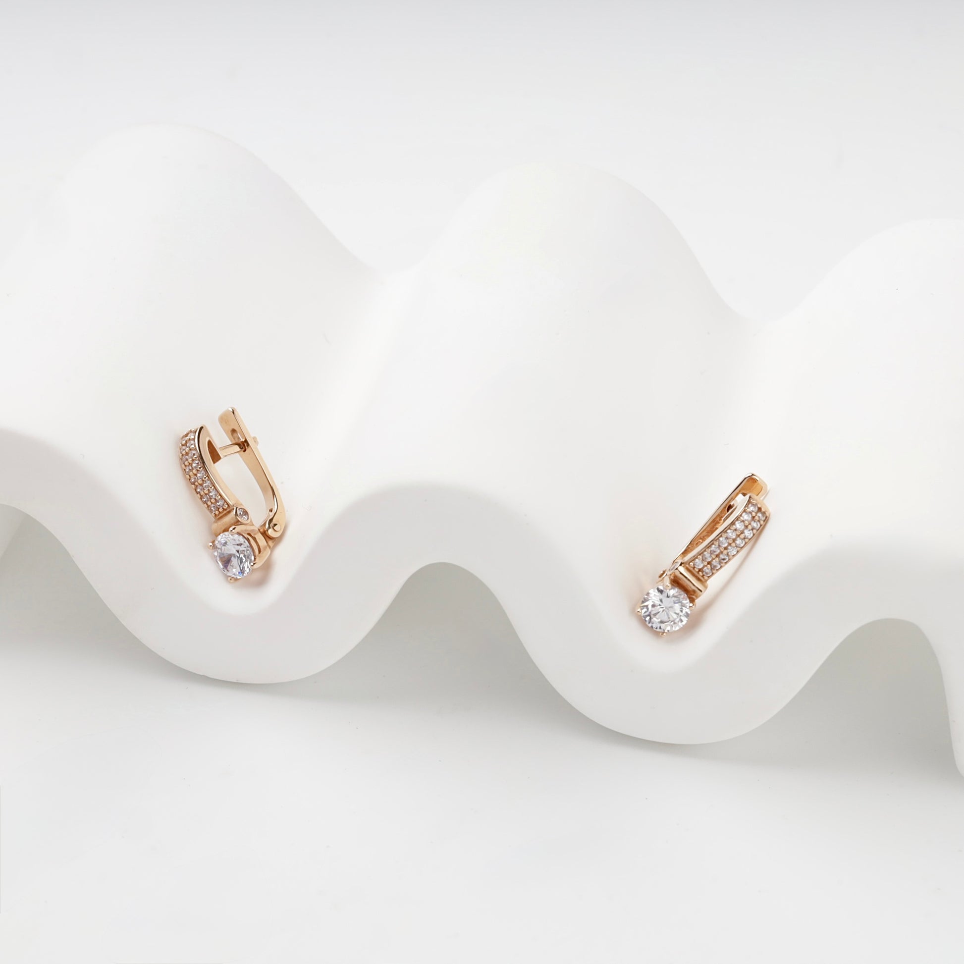 Rose Gold 14K drop earrings with round center stones, detail view — Kabluchka