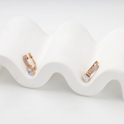 Rose Gold 14K drop earrings with round center stones, detail view — Kabluchka