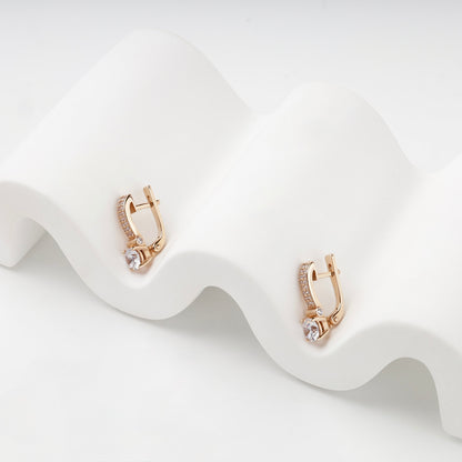 Rose gold and cubic zirconia earrings, side view — Kabluchka