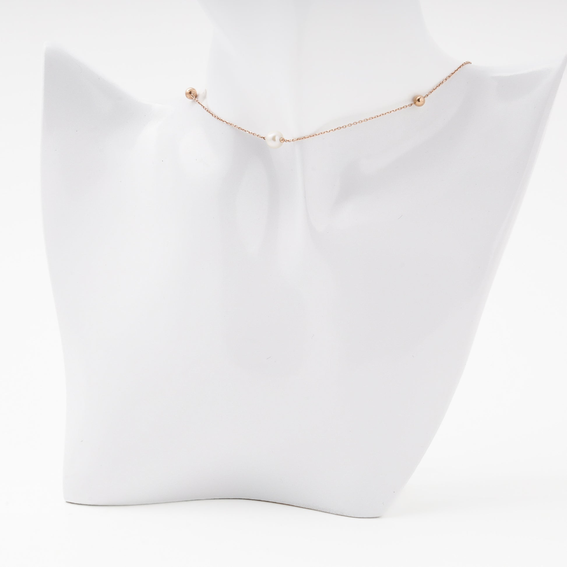 Rose Gold 585 Pearl Necklace on Surface — Kabluchka