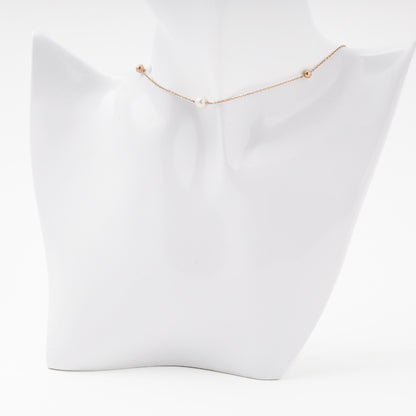 Rose Gold 585 Pearl Necklace on Surface — Kabluchka